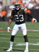 Denver Broncos defensive end Jeremy Mincey (57) wipes his face as