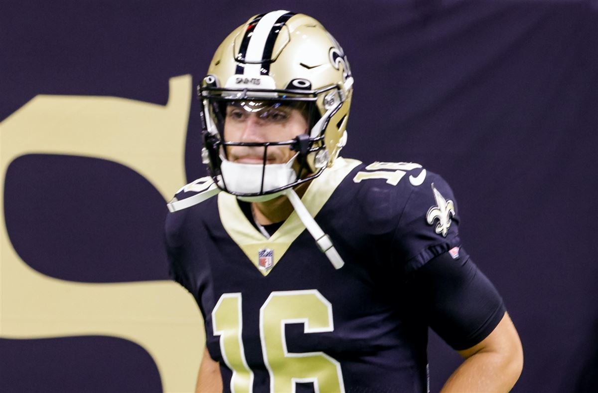 New Orleans Saints quarterback Ian Book (16) runs up field during