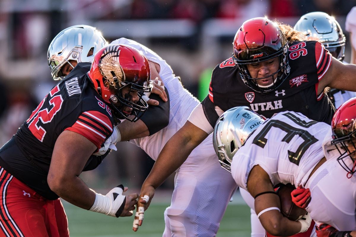 Utah defensive lineman John Penisini runs a drill at the NFL