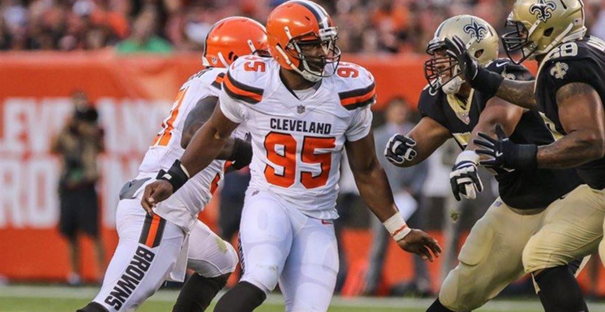 FILE - New Orleans Saints tight end Juwan Johnson (83) attempts to block Cleveland  Browns defensive end Myles Garrett (95) during an NFL football game,  Saturday, Dec. 24, 2022, in Cleveland. As