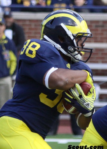 Michigan's Thomas Rawls breaks out, batters Lions