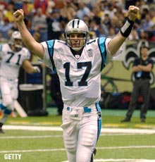 Running back DeShaun Foster of the Carolina Panthers scores on a 33 News  Photo - Getty Images