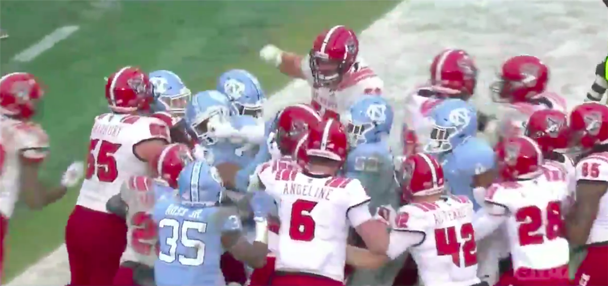 WATCH: Postgame Brawl Breaks Out In NC State's 34-28 Win Vs. UNC