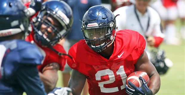 September 24, 2016: D'Andre Walker (15) Georgia Bulldogs linebacker hits  Jason Pellerin (7) Ole Miss Rebels quarterback as he passes during the game  between the Georgia Bulldogs and Ole Miss Rebels .