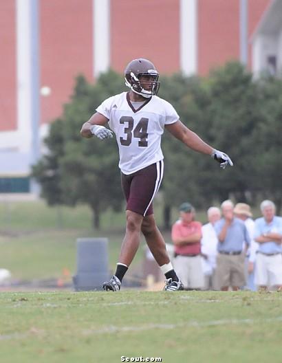 Former Mississippi State football great K.J. Wright helping Olive Branch