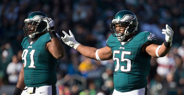 FILE - In this Sunday, Nov. 6, 2016 file photo, New York Giants quarterback  Eli Manning (10) moves out of the pocket under pressure from Philadelphia  Eagles defensive end Vinny Curry (75)