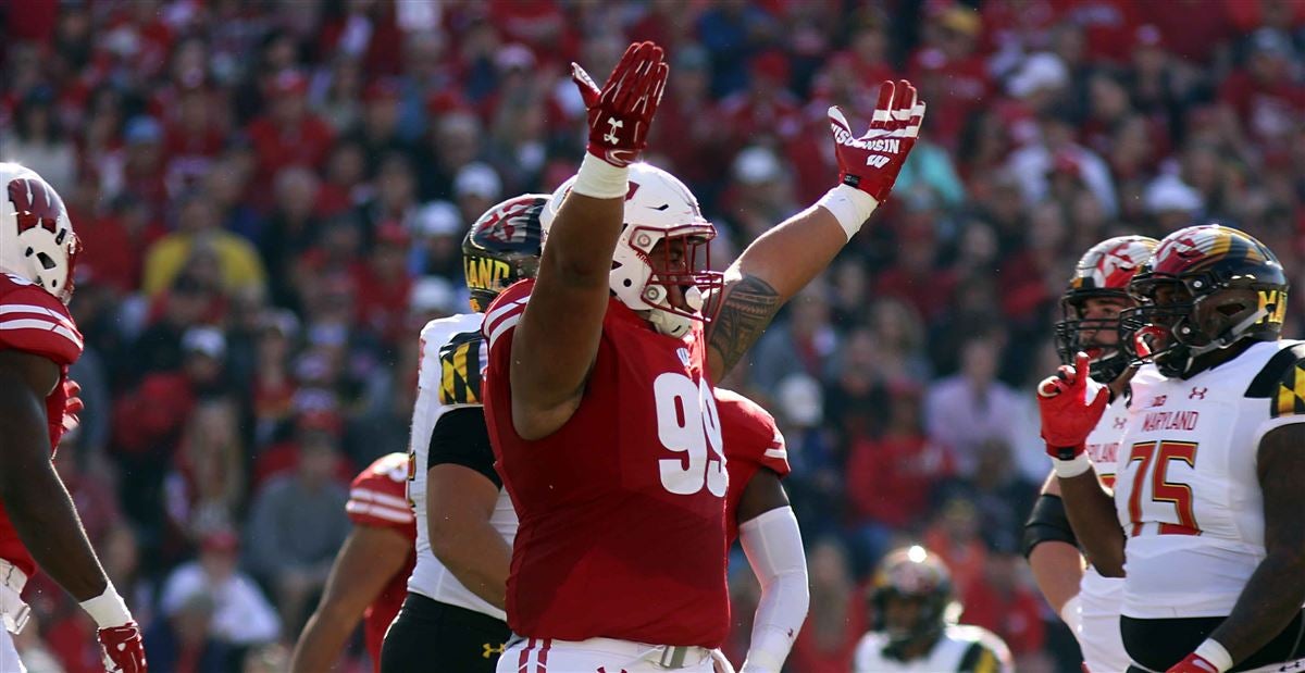 Packers sign former Badger Olive Sagapolu