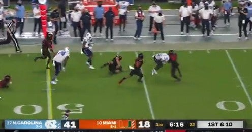 Video: North Carolina RB Javonte Williams trucks defender Video: North Carolina RB Javonte Williams trucks defender