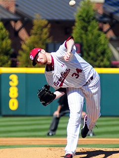 Starting pitcher Jordan Montgomery (34) of the South Carolina Gamecocks  delivers a pitch in an NCAA Division I Baseball Regional Tournament game  against the Campbell Camels on Friday, May 30, 2014, at