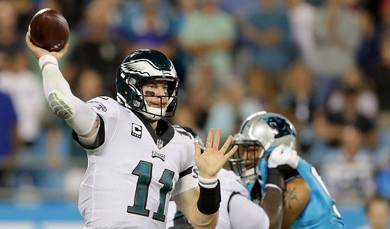 Philadelphia Eagles rookie quarterback,CARSON WENTZ, completes a pass in  the third quarter - Gold Medal Impressions