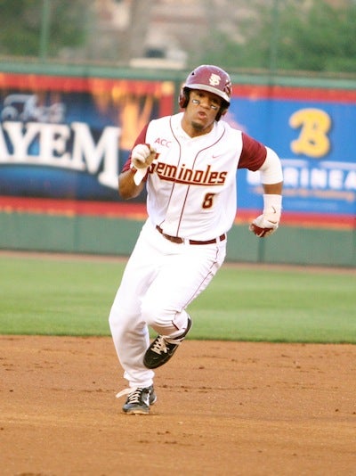 Former Boynton Beach little league star Devon Travis soaks in