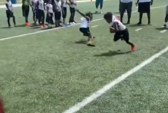 Watch Devin Hester's son juke defenders like his dad