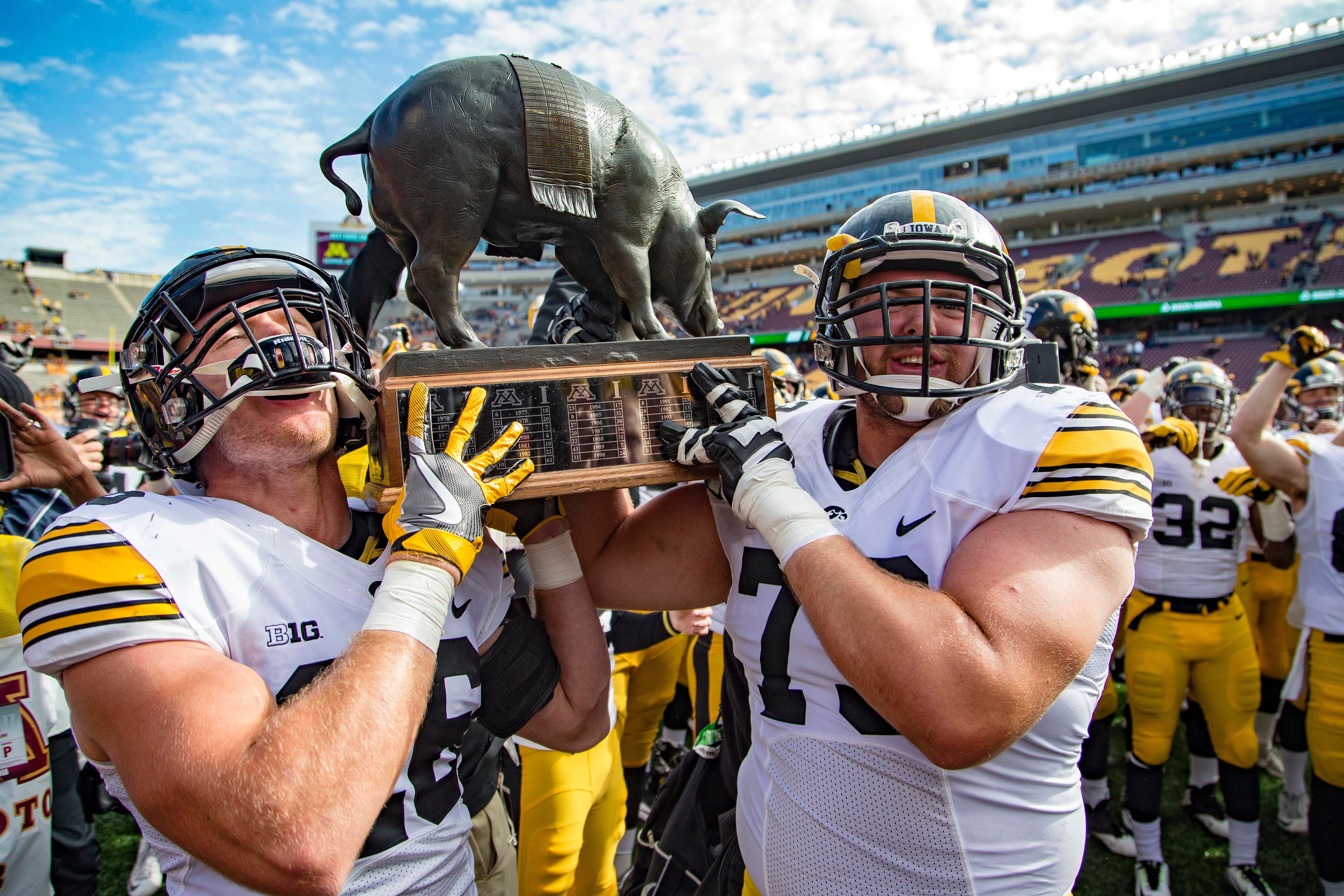 best-rivalry-trophies-in-college-football