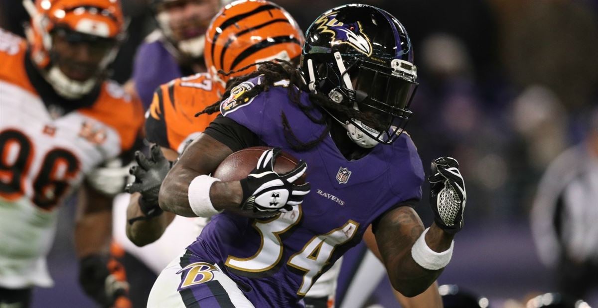 Why Running Back Alex Collins Wears a Super Dark Facemask Visor