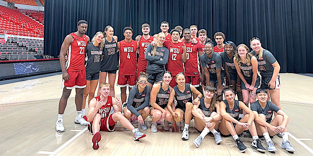 Freshman Marcus Wilson slams home WSU’s ZZU Mania hoops night