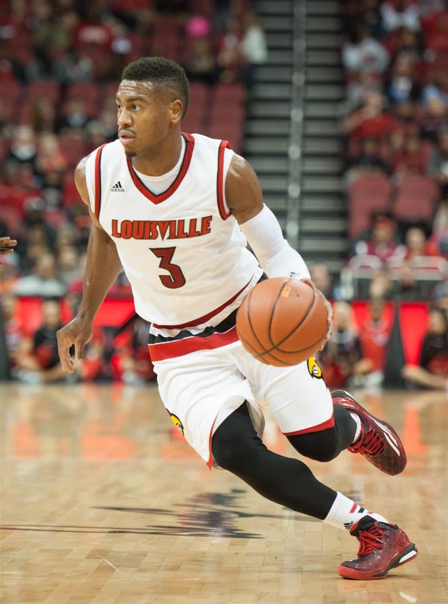 Louisville Cardinals guard Trey Lewis (3) dribbles the ball up the court  during the NCAA basketball game between Louisville and Clemson on Sunday,  January 10, 2016 at Bon Secours Arena in Greenville