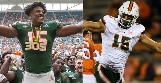 Miami edge rusher Gregory Rousseau, right, holds a team jersey