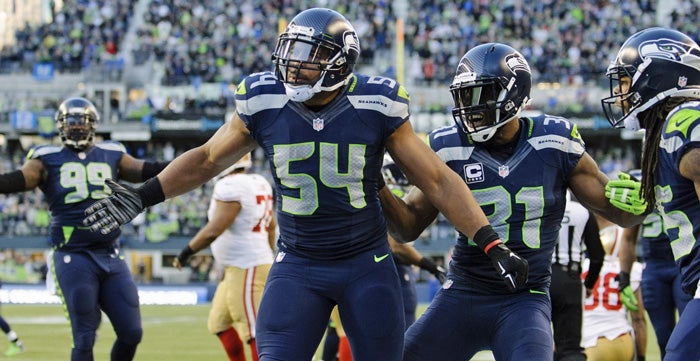 Bobby Wagner, Kam Chancellor react to Russell Wilson deal