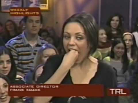 Mila Kunis can stick her fist in her mouth