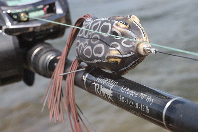 https://s3media.247sports.com/Uploads/wired2fish/2014/07/fitzgerald-all-purpose-casting-rod-with-frog.jpg